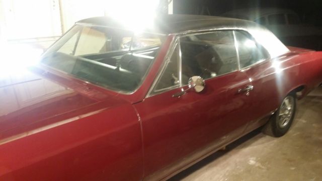 maroon 1967 Chevrolet Chevelle Coupe with Black interior