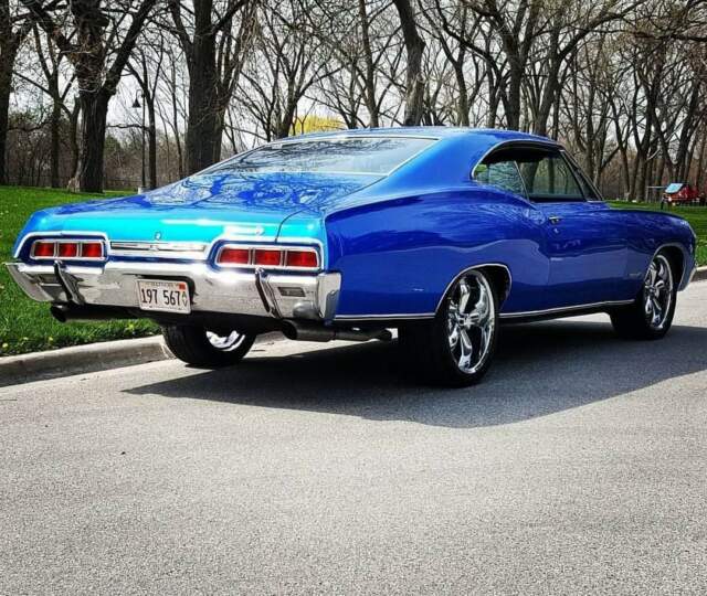Blue 1967 Chevrolet Impala Coupe with Black interior