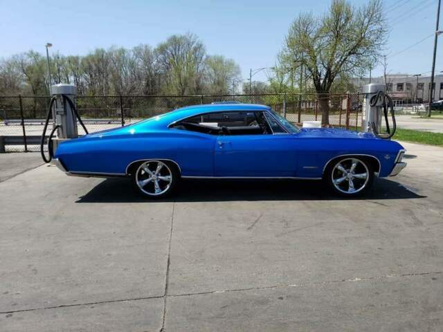 Blue 1967 Chevrolet Impala Coupe with Black interior
