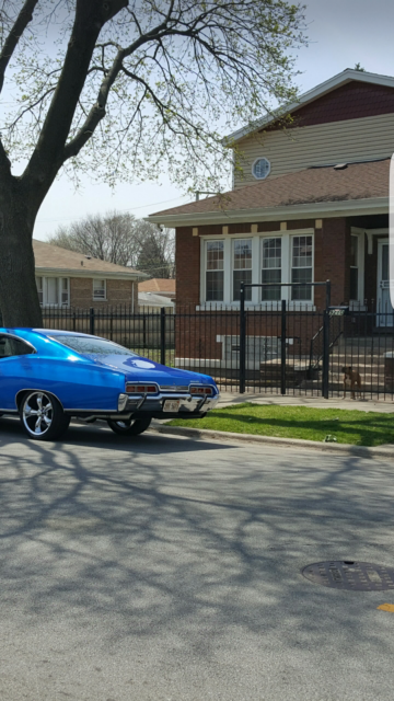 Blue 1967 Chevrolet Impala Coupe with Black interior