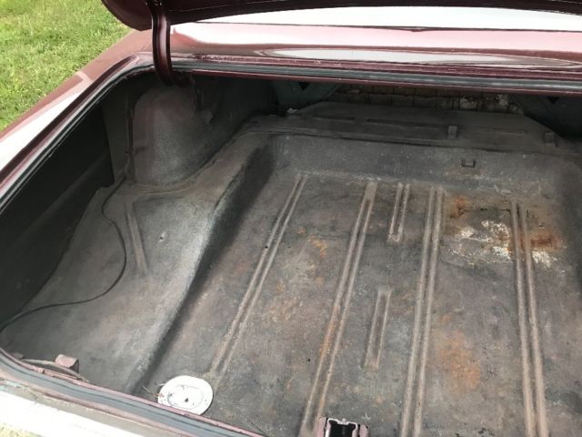 Maroon 1967 Chevrolet Nova Sedan with Black interior