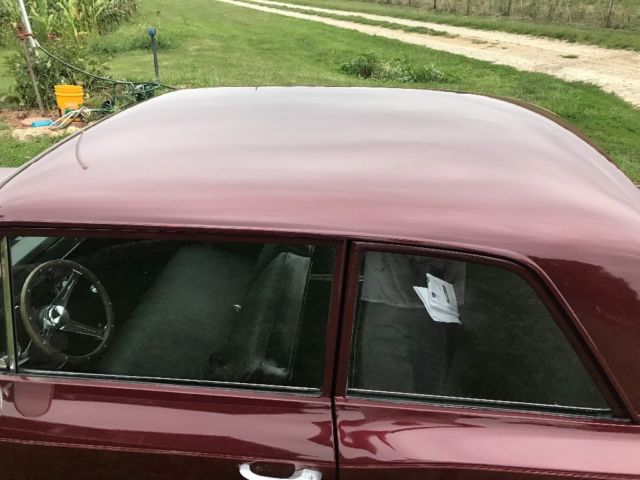 Maroon 1967 Chevrolet Nova Sedan with Black interior