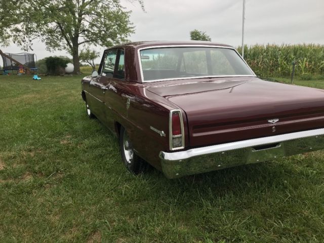 Maroon 1967 Chevrolet Nova Sedan with Black interior