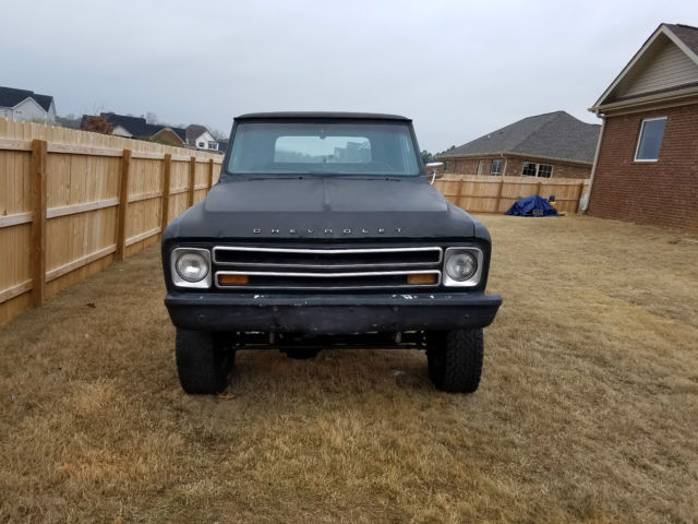 flat black primer 1967 Chevrolet C-10 Pickup with black interior