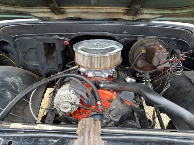 flat black primer 1967 Chevrolet C-10 Pickup with black interior