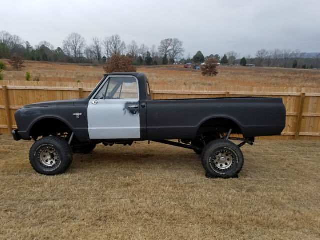 flat black primer 1967 Chevrolet C-10 Pickup with black interior