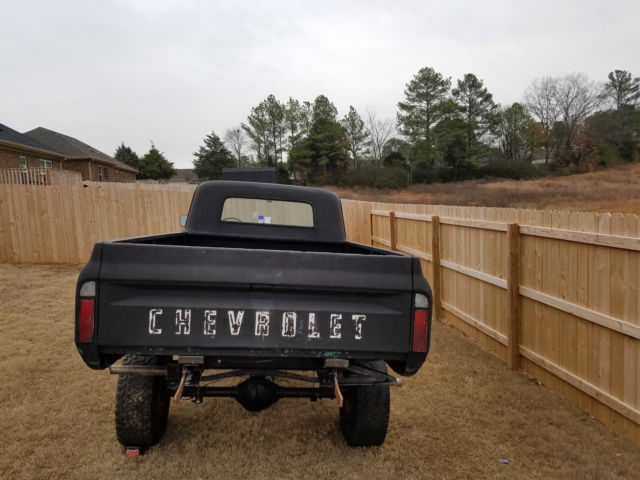 flat black primer 1967 Chevrolet C-10 Pickup with black interior