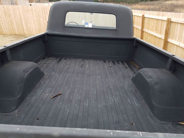 flat black primer 1967 Chevrolet C-10 Pickup with black interior