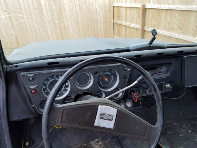 flat black primer 1967 Chevrolet C-10 Pickup with black interior