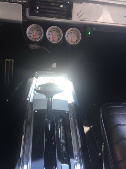 Silver 1967 Chevrolet Nova with Black interior