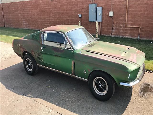 Gold 1967 Ford Mustang Fastback with Gold interior