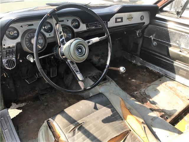 Gold 1967 Ford Mustang Fastback with Gold interior