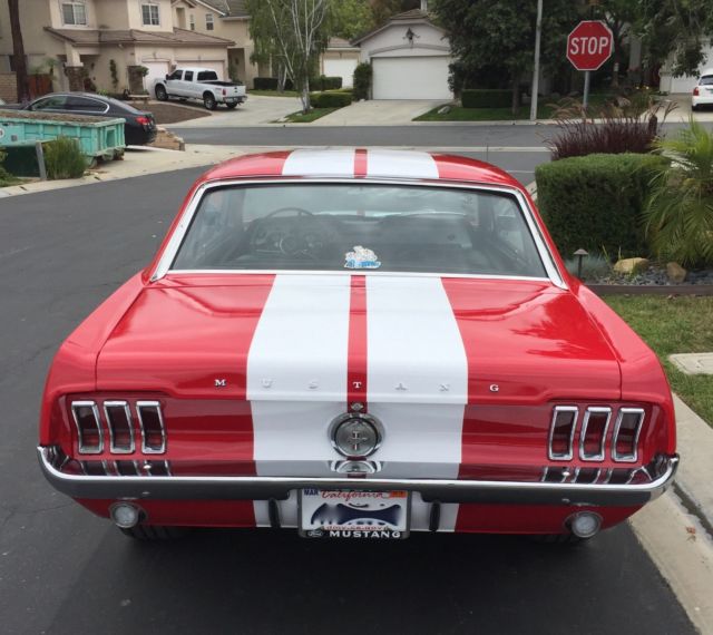 Red 1967 Ford Mustang Coupe with Black interior