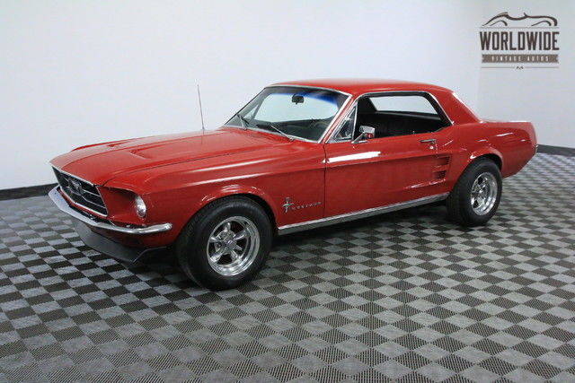 Red 1967 Ford Mustang with Black interior