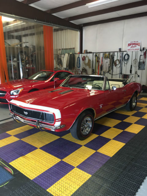 Red 1967 Chevrolet Camaro with White interior
