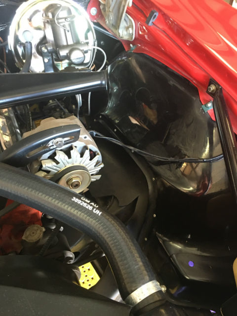 Red 1967 Chevrolet Camaro with White interior