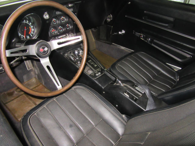 Yellow 1968 Chevrolet Corvette with Black interior