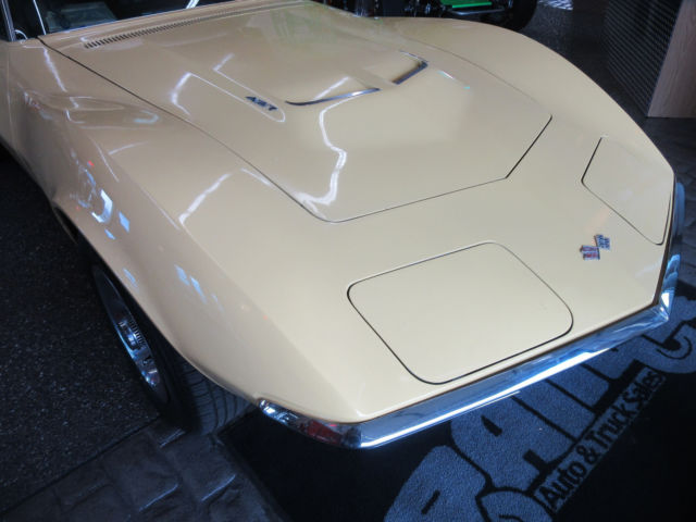 Yellow 1968 Chevrolet Corvette with Black interior