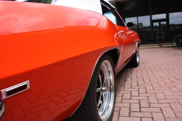 Orange 1969 Chevrolet Camaro Convertible with White interior