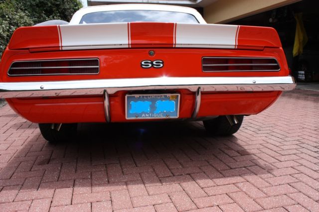 Orange 1969 Chevrolet Camaro Convertible with White interior