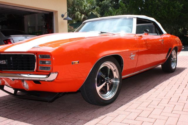 Orange 1969 Chevrolet Camaro Convertible with White interior