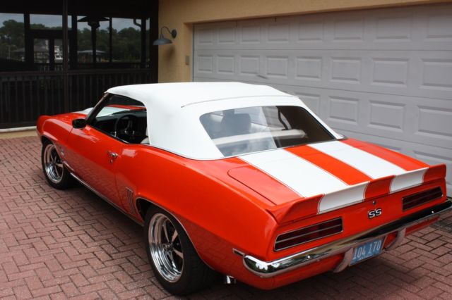 Orange 1969 Chevrolet Camaro Convertible with White interior