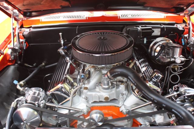 Orange 1969 Chevrolet Camaro Convertible with White interior
