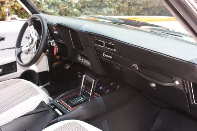 Orange 1969 Chevrolet Camaro Convertible with White interior
