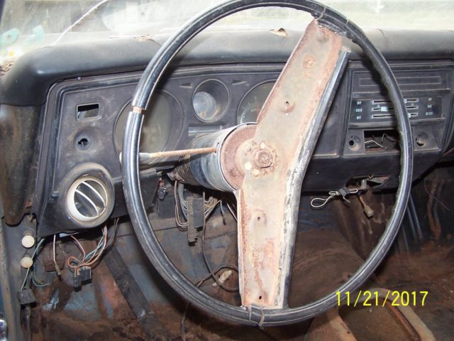 Green 1969 Chevrolet Chevelle Coupe with Blue interior