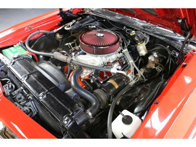 Red 1969 Chevrolet Chevelle Convertible with White interior