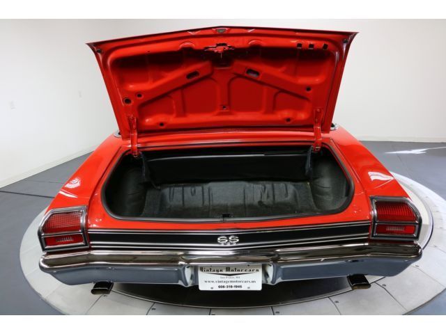 Red 1969 Chevrolet Chevelle Convertible with White interior