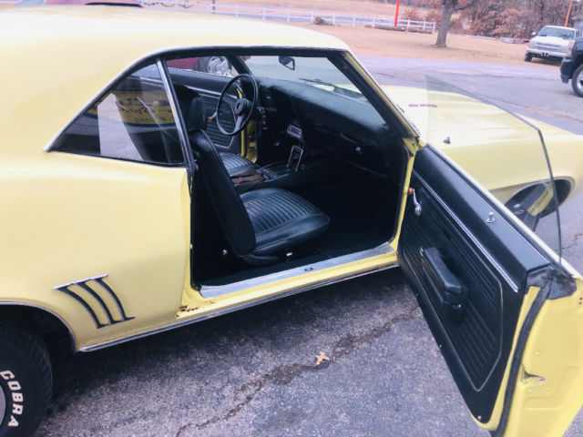 Yellow 1969 Chevrolet Camaro -- with Black interior
