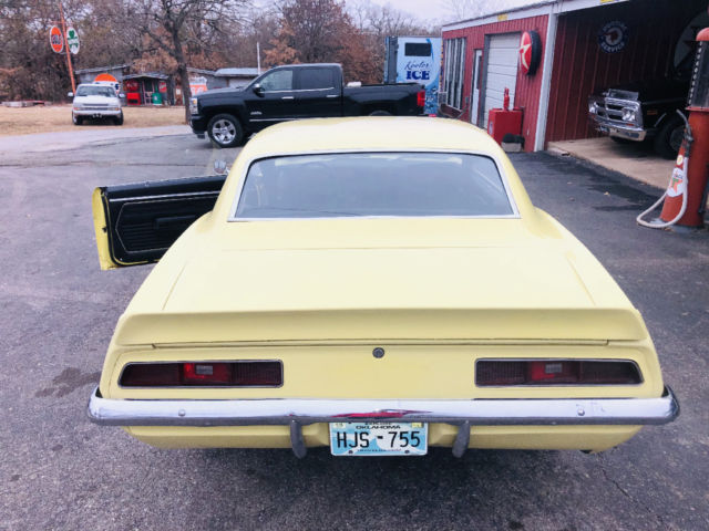 Yellow 1969 Chevrolet Camaro -- with Black interior
