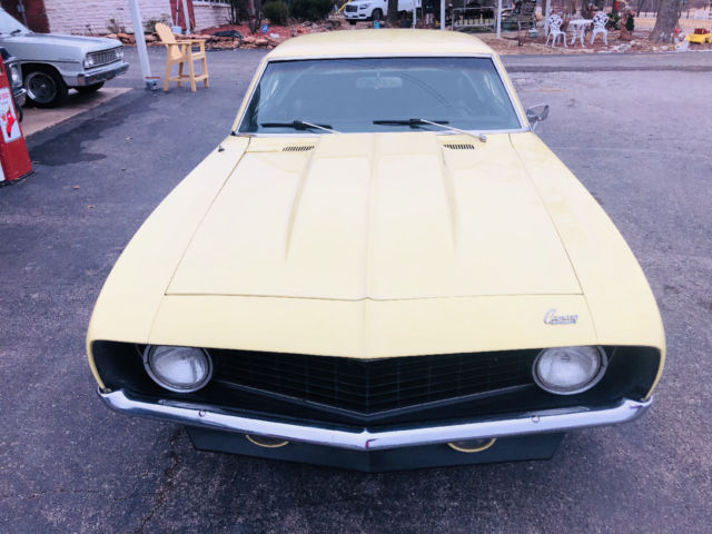 Yellow 1969 Chevrolet Camaro -- with Black interior
