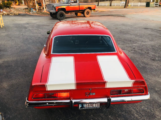 Red 1969 Chevrolet Camaro -- with Black interior