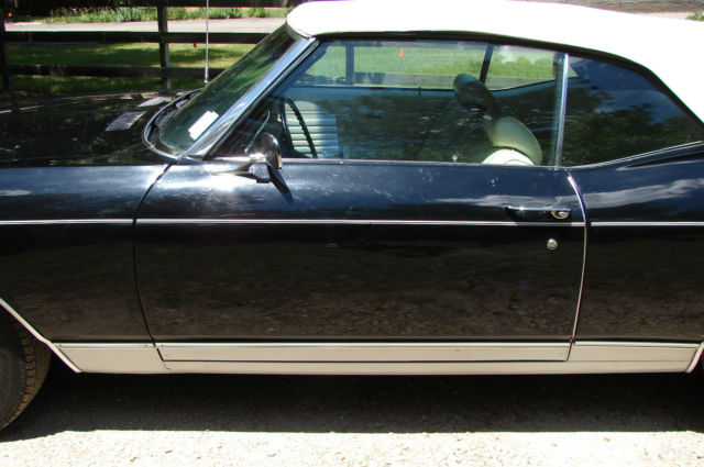 Black 1969 Chevrolet Chevelle Convertible with Ivory interior