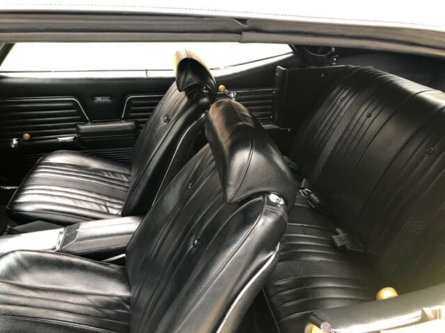 Yellow 1969 Chevrolet Chevelle Convertible with Black interior