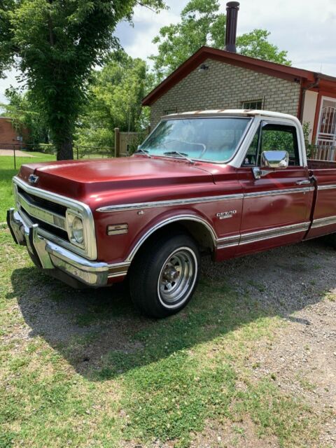 Red 1969 Chevrolet C-10 1/2 ton fleet side pick up with Red interior