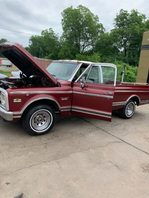 Red 1969 Chevrolet C-10 1/2 ton fleet side pick up with Red interior