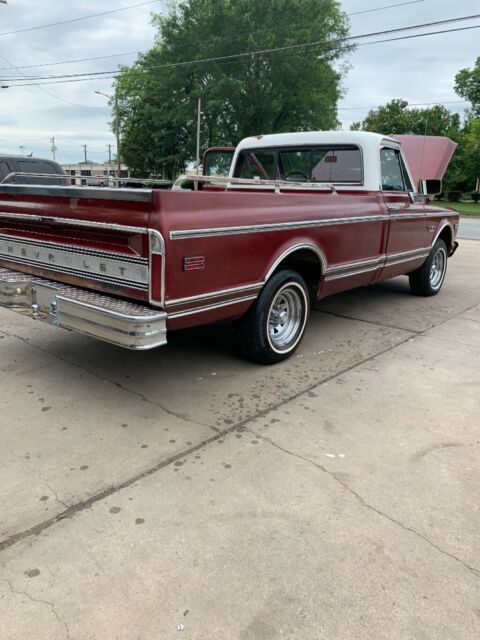 Red 1969 Chevrolet C-10 1/2 ton fleet side pick up with Red interior
