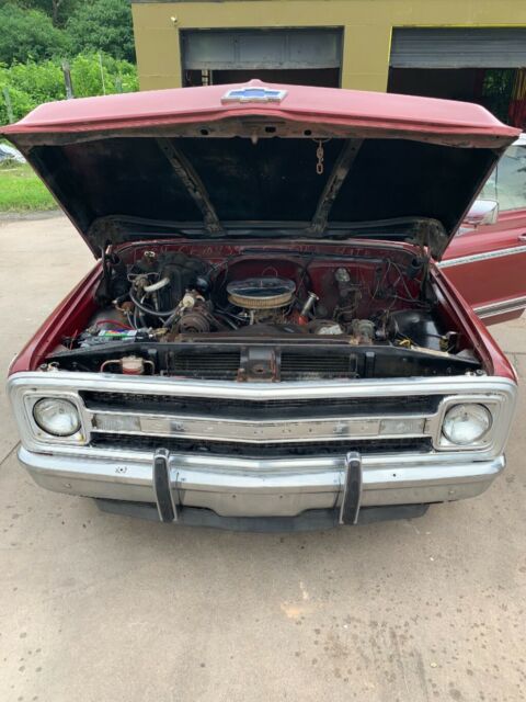 Red 1969 Chevrolet C-10 1/2 ton fleet side pick up with Red interior