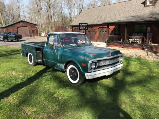 Green 1969 Chevrolet C-10 with Brown interior