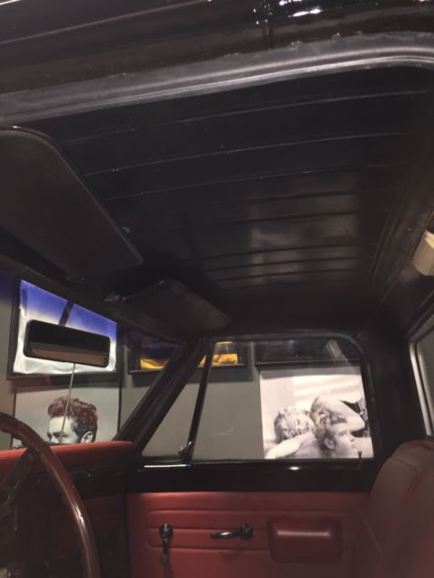 Black 1969 Chevrolet C-10 Stepside with Red interior