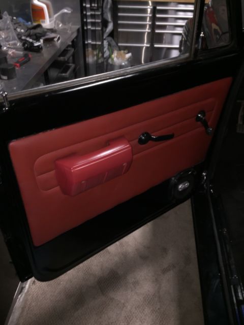 Black 1969 Chevrolet C-10 Stepside with Red interior