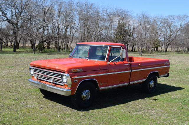 Orange 1969 Ford F-250 Standard Cab Pickup with Black interior