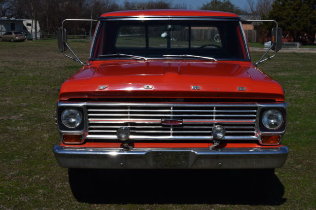 Orange 1969 Ford F-250 Standard Cab Pickup with Black interior