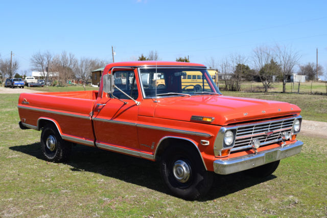 Orange 1969 Ford F-250 Standard Cab Pickup with Black interior