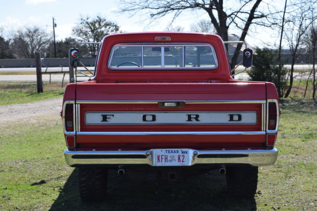 Orange 1969 Ford F-250 Standard Cab Pickup with Black interior