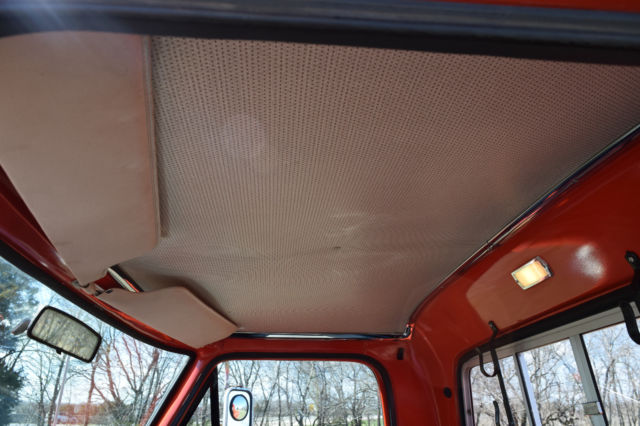 Orange 1969 Ford F-250 Standard Cab Pickup with Black interior