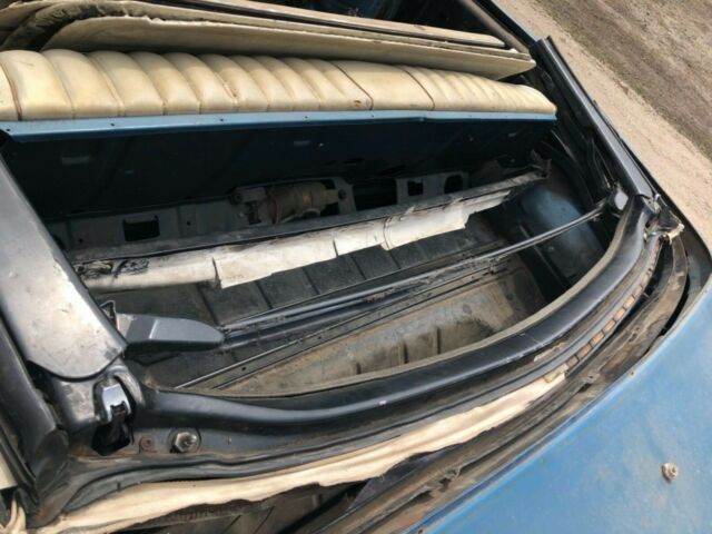 Blue 1969 Chevrolet Impala Convertible with White interior